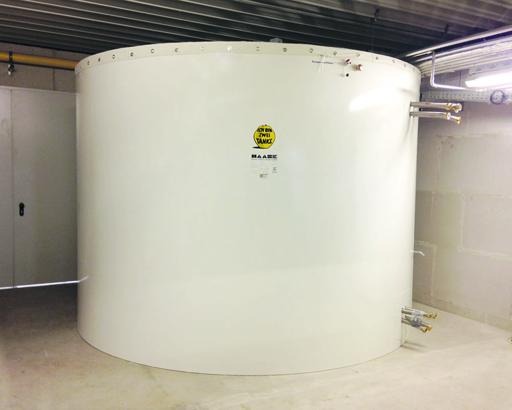 This buffer hot water tank stores the heat for a bakery and has a volume of 15,000 liters.