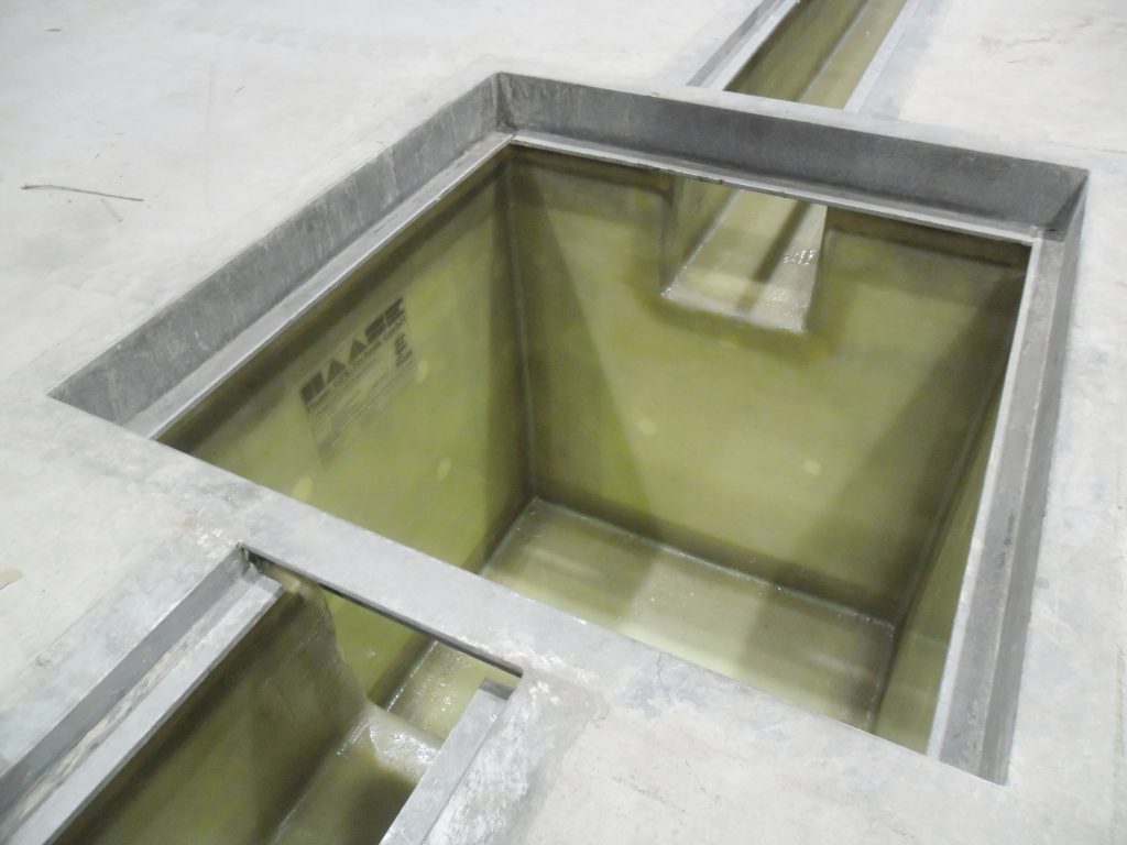 Gutters and pump sumps are lined with GRP.