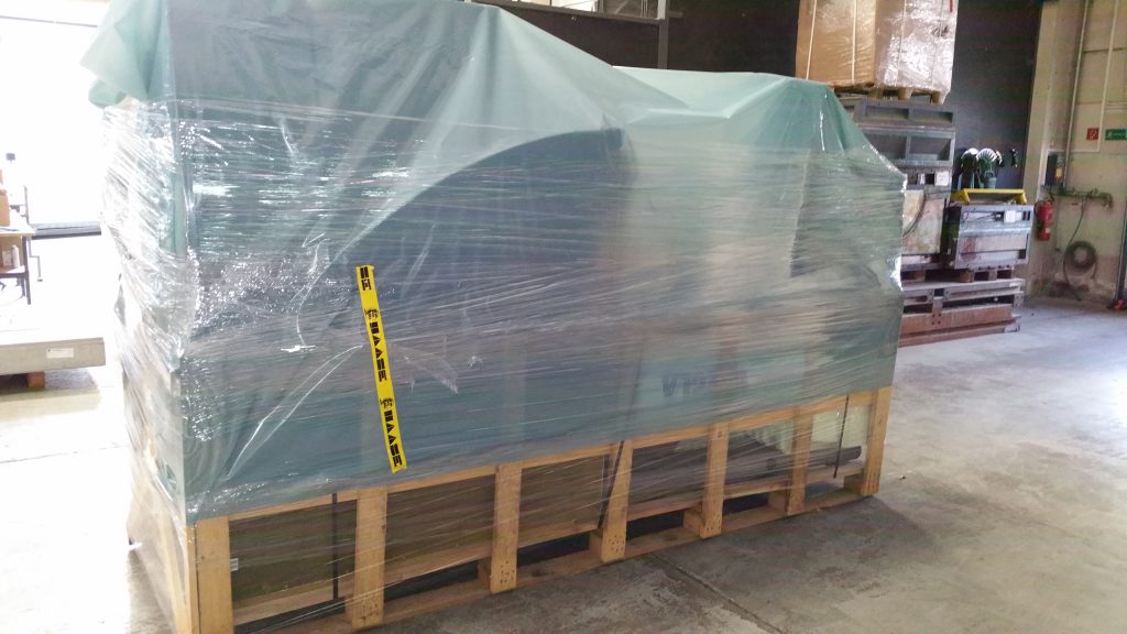 The individual parts of the hot water tank fit on a pallet.