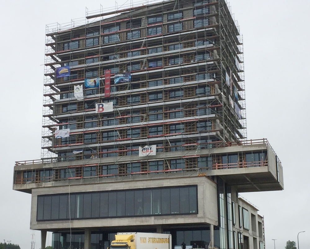 The hot water tank was installed on the top floor shortly before the hotel opened.