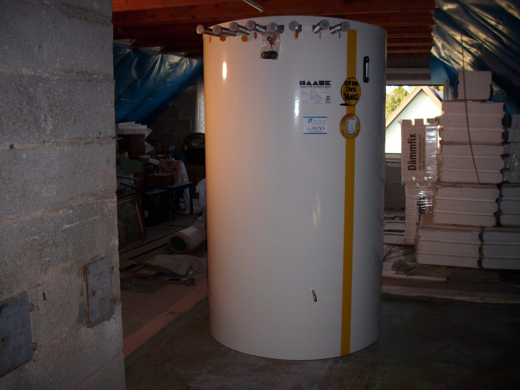 The installed hot water tank in the attic.