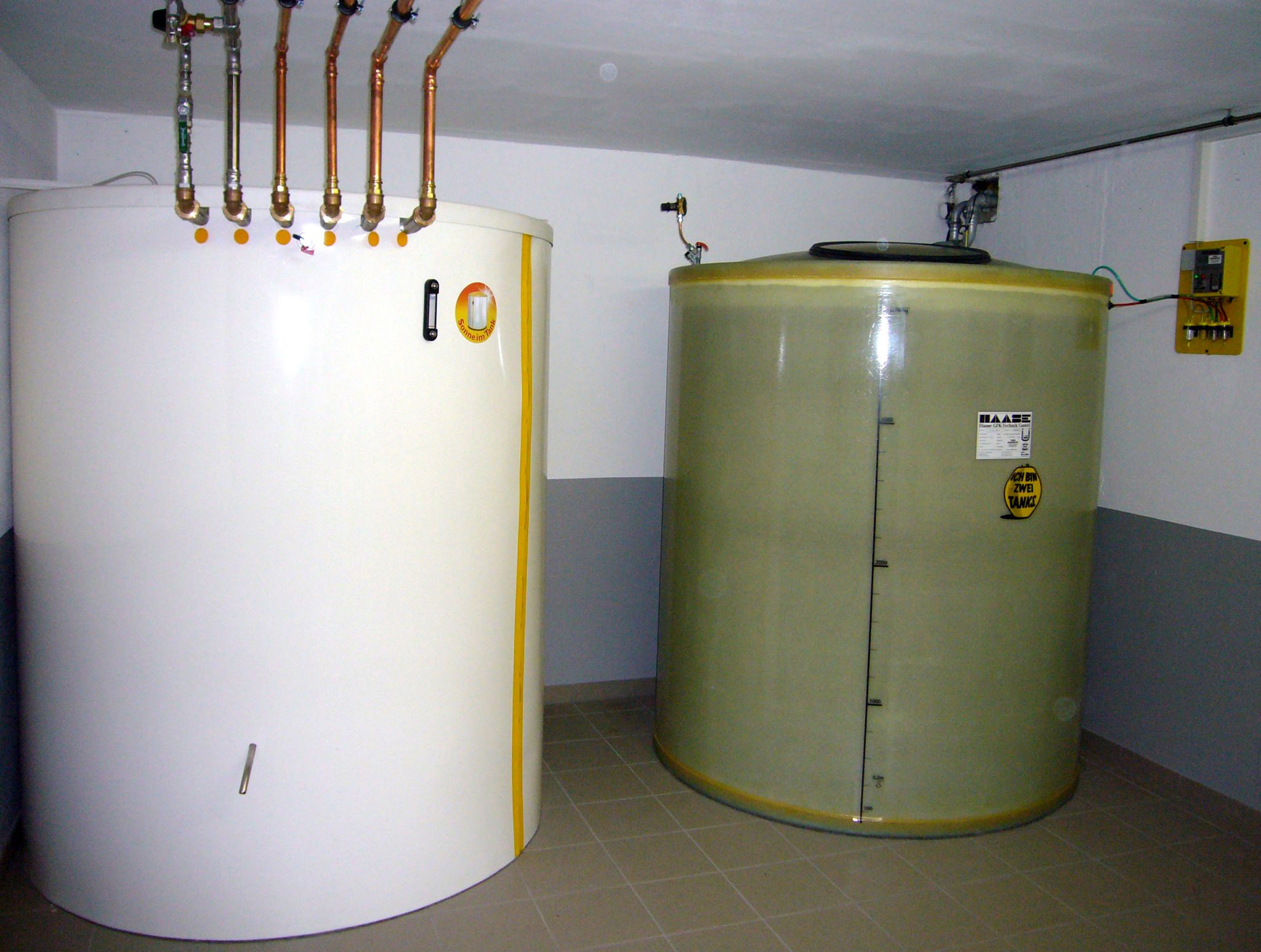 Hot water tank and basement tank hybrid solution from Haase