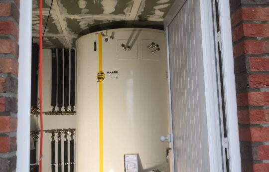 The tank is finished and ready for connection to the heating system.